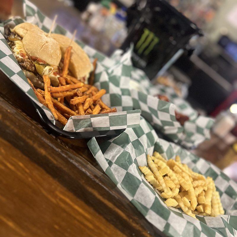 Wings, burger, and fries at Benola's